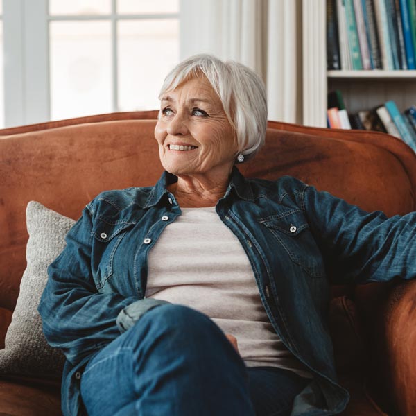 senior woman sitting in chair