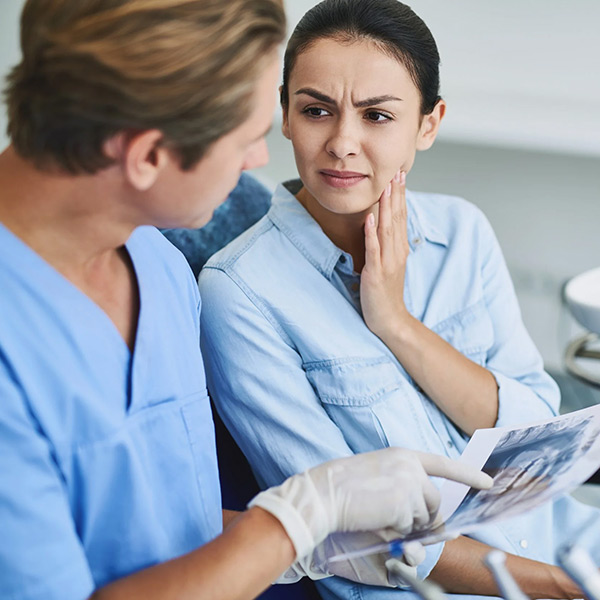doctor showing reports to the patient